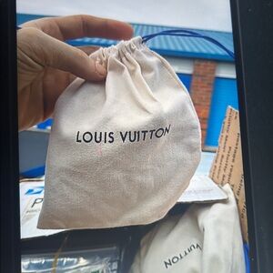 Louis Vuitton Cream Drawstring Bag/LV Masks